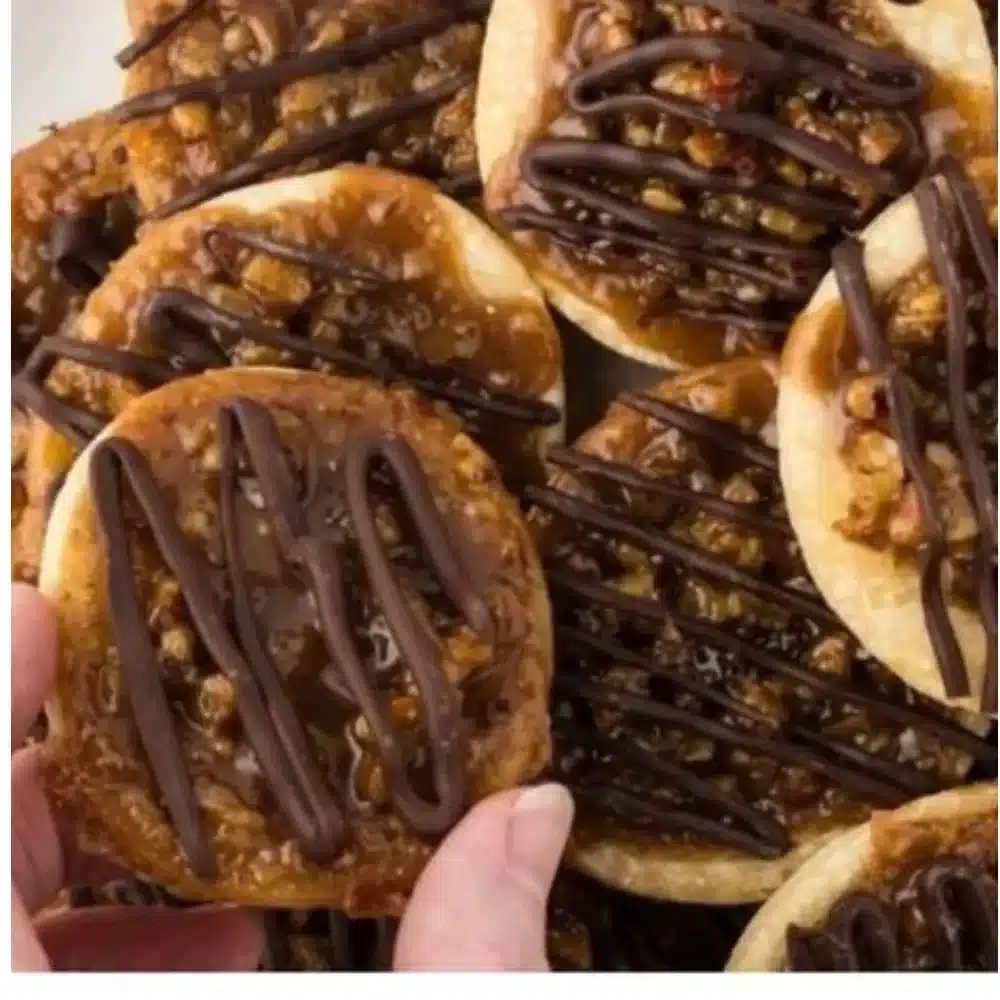 Buttery pecan pie cookies on a plate ready to be enjoyed