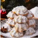Plate of delicious Snowball Cookies dusted with powdered sugar