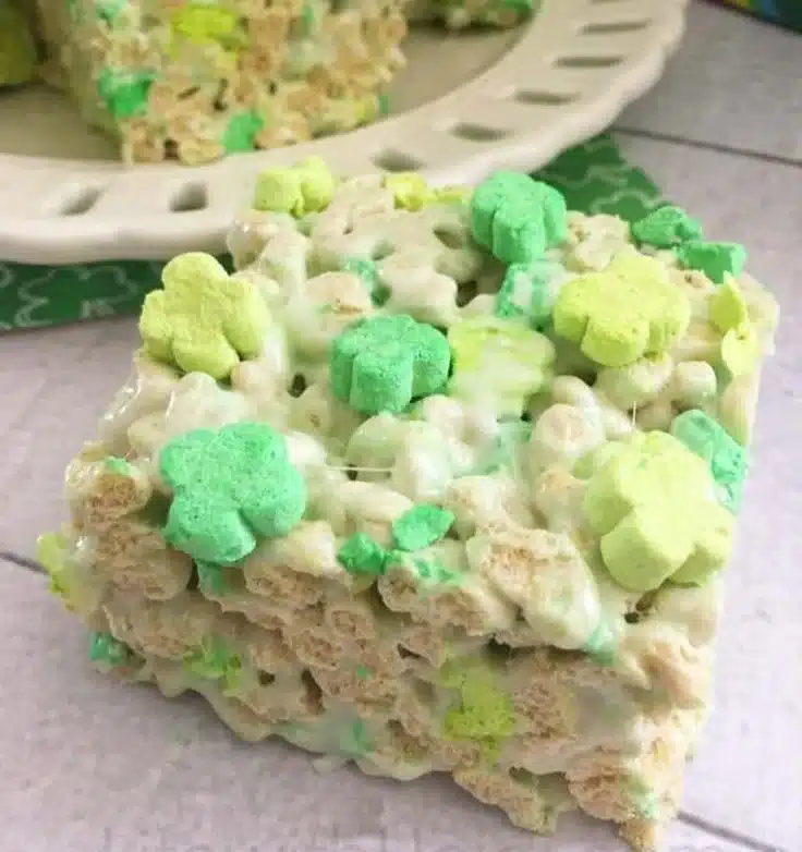 Assorted St. Patrick's Day desserts including cupcakes, cookies, and cakes.