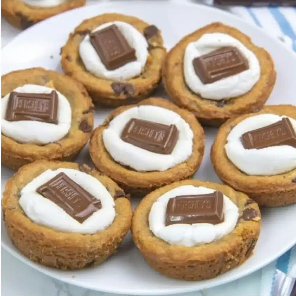 Delicious S’Mores Cookie Cups with chocolate and marshmallows