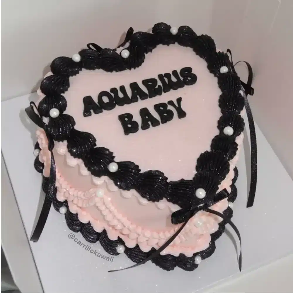 Delicious Aquarius Baby Cake decorated with astrological themes.