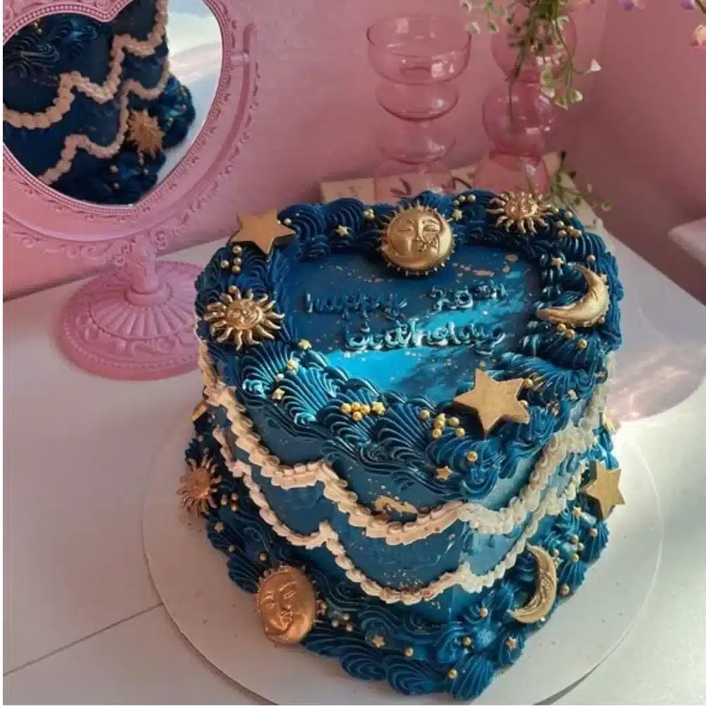 Celestial Dark Blue Heart Cake decorated with stars and edible glitter