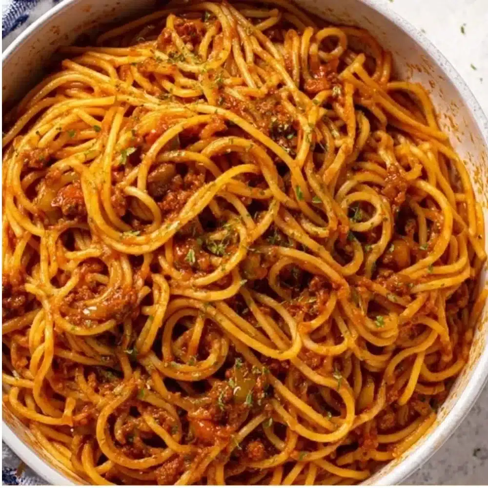 Delicious plate of Chicago Spaghetti with rich sauce and toppings