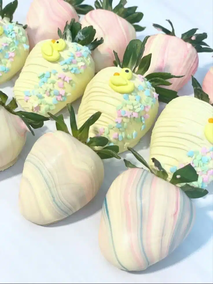 A plate of chocolate covered strawberries, an elegant dessert for any celebration.