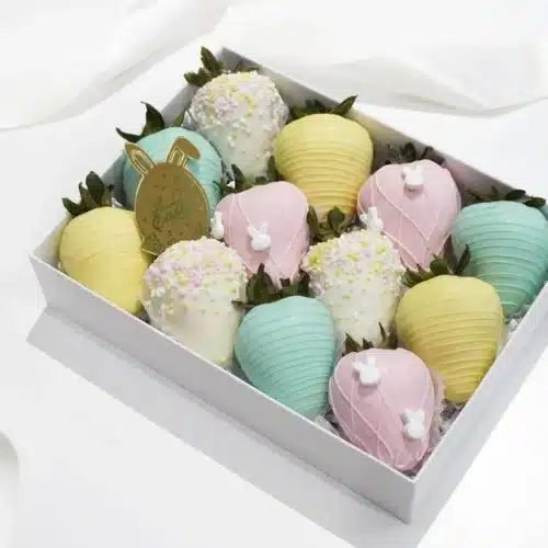 Delicious chocolate-covered strawberries on a white plate