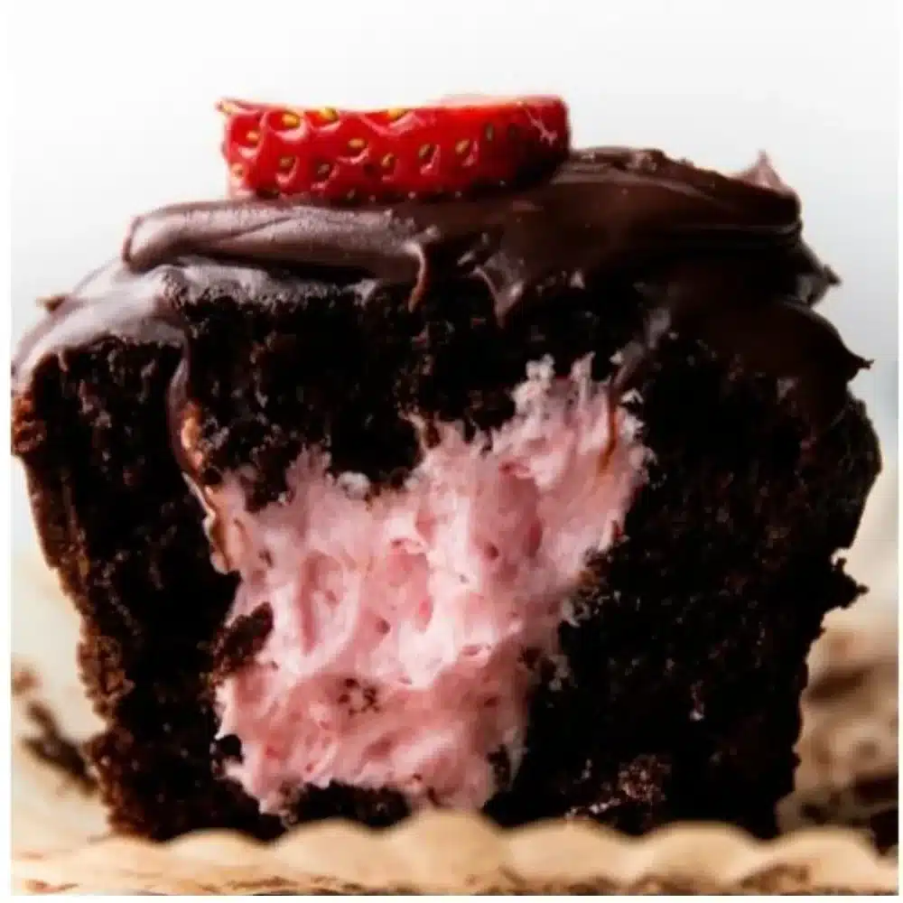 Chocolate covered strawberry buttercream cupcakes on a decorative platter