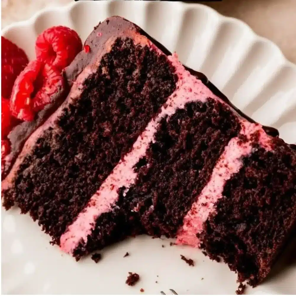 Delicious Chocolate Raspberry Cake with fresh raspberries and chocolate ganache