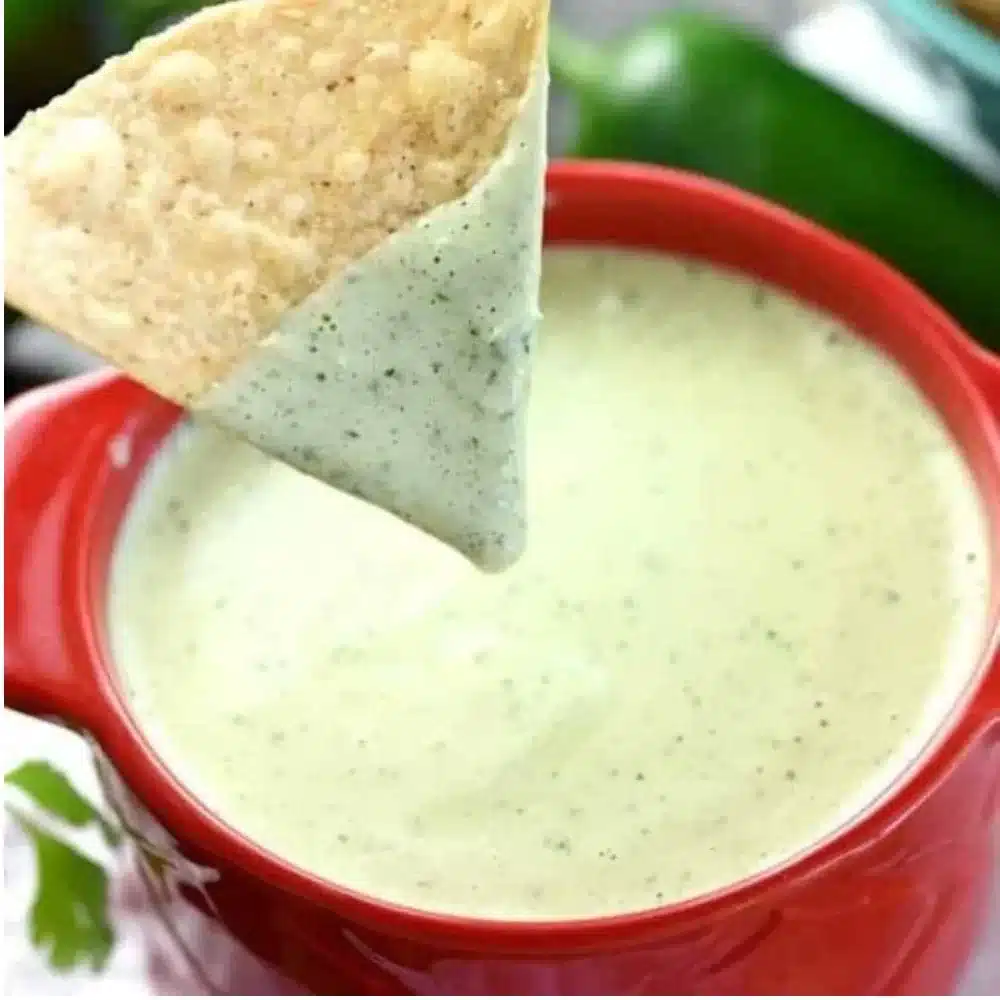 Creamy jalapeño dip served with tortilla chips