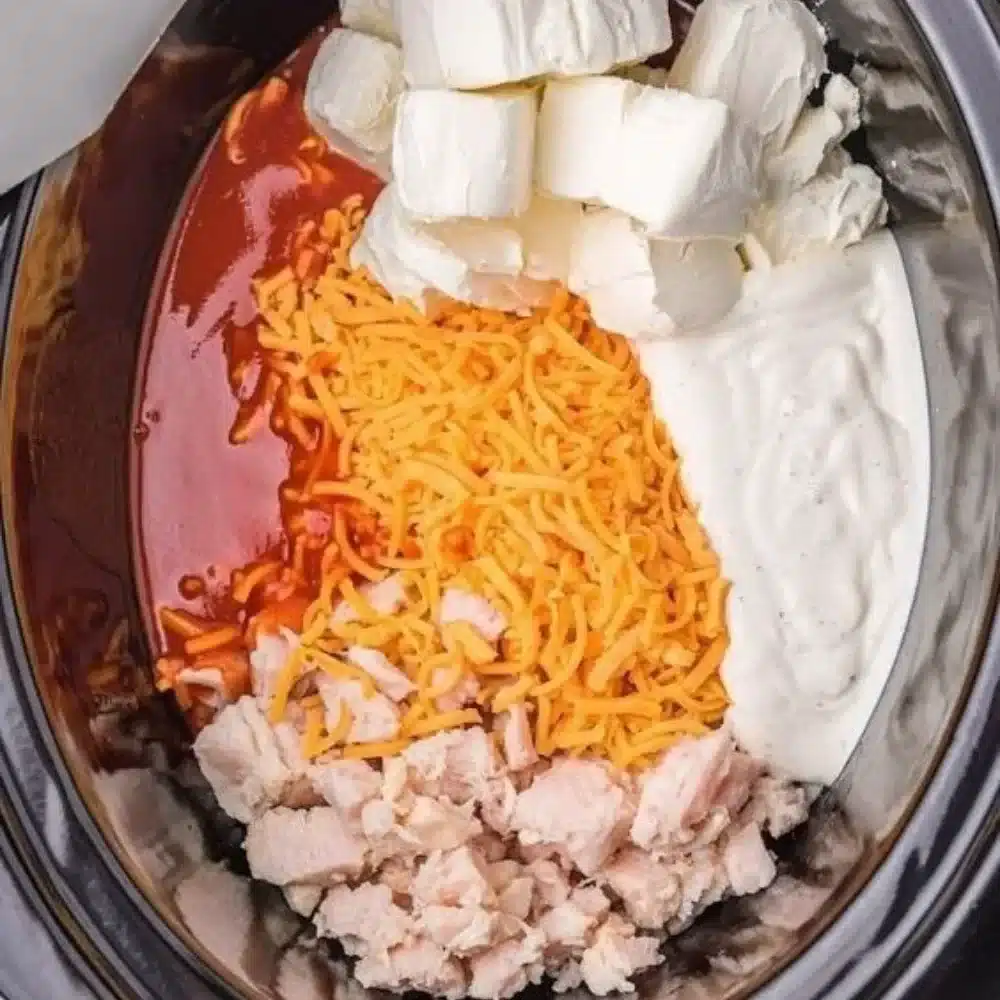 Crockpot Buffalo Chicken Dip served in a bowl with tortilla chips.