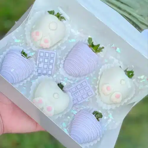 Easter chocolate covered strawberries designed as cute bunny bums.