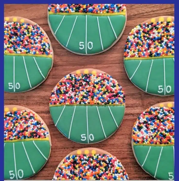 Decorated football stadium sugar cookies for game day celebrations