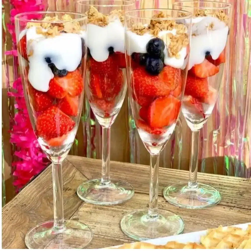 Galentine's Day brunch setup with festive decorations and delicious brunch spread