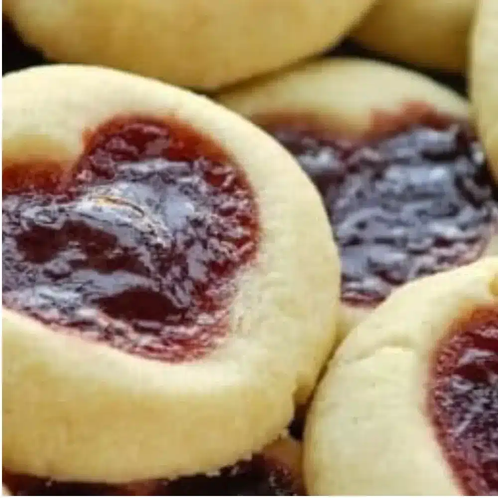 Freshly baked Heart Jam Cookies with vibrant jam filling