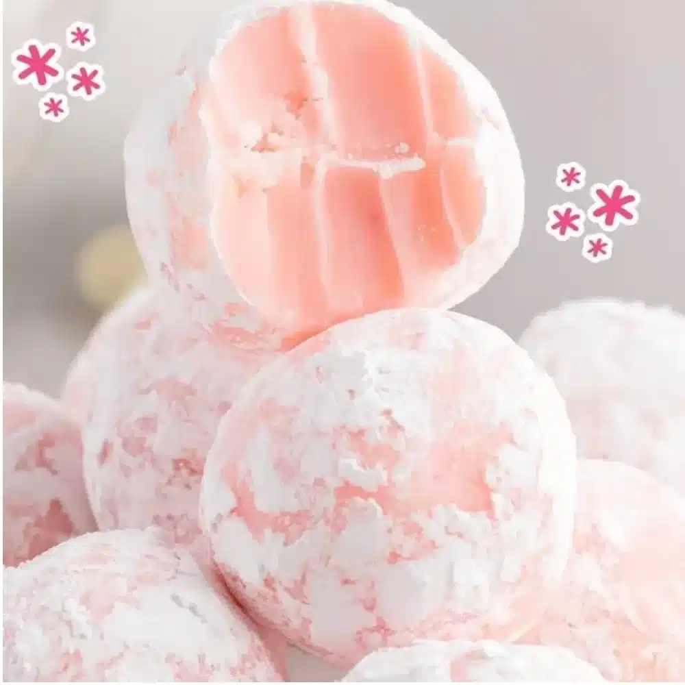 Delicious homemade strawberry truffles on a platter