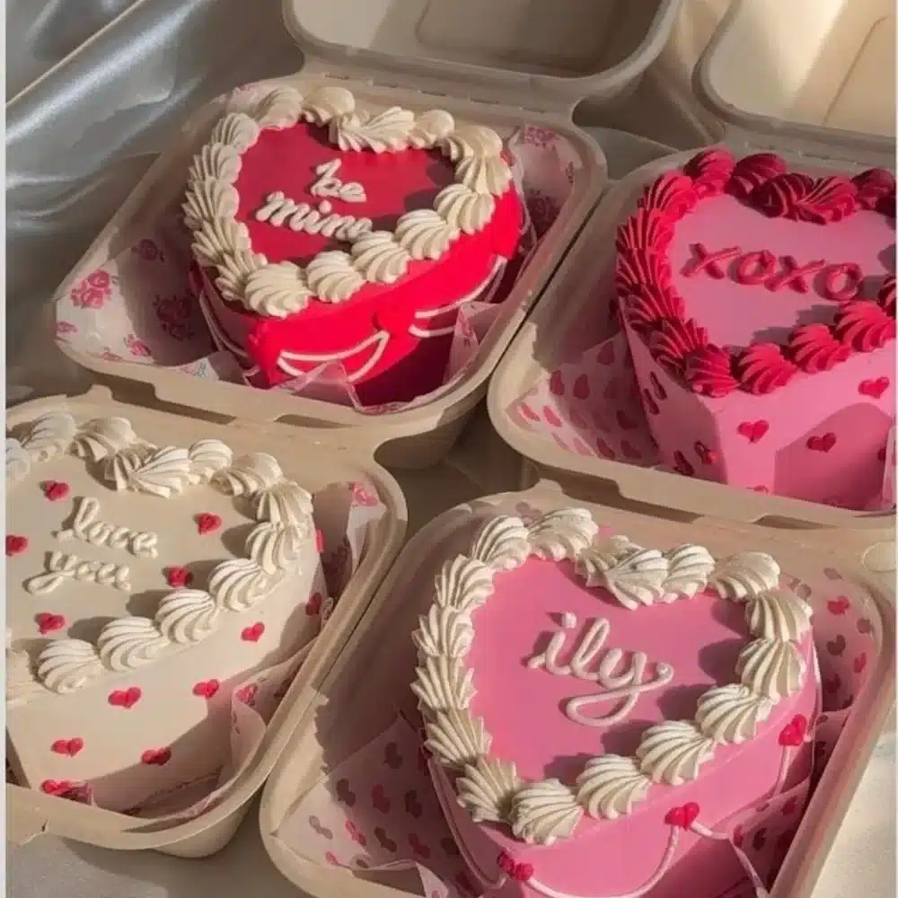 Assorted Valentine Cakes and Cupcakes with love-themed designs