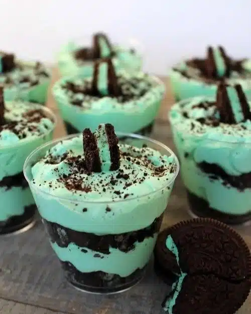 Delicious Mint Oreo Parfaits layered with cream and Oreo cookies