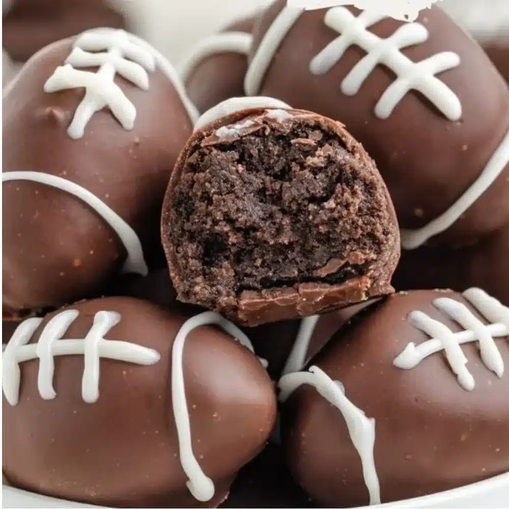 Oreo Football Truffles decorated as footballs for game day treats