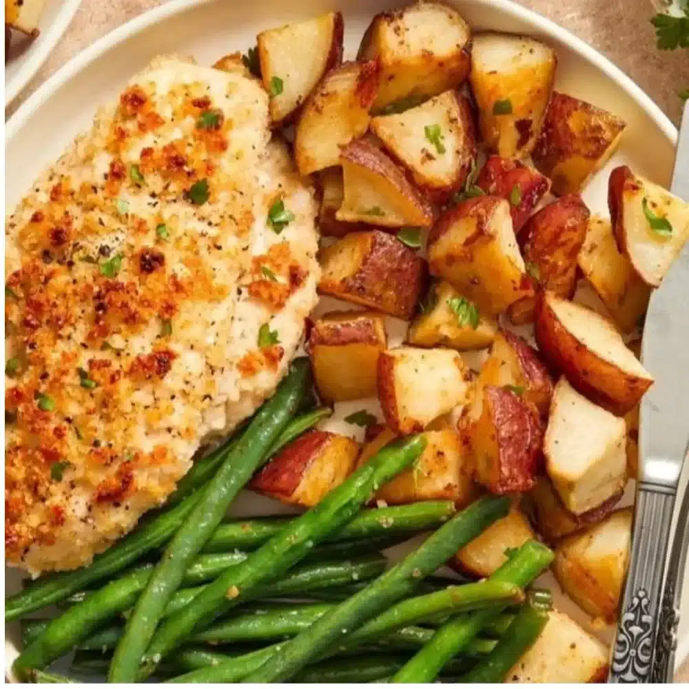 Delicious Parmesan Crusted Chicken on a sheet pan with vegetables