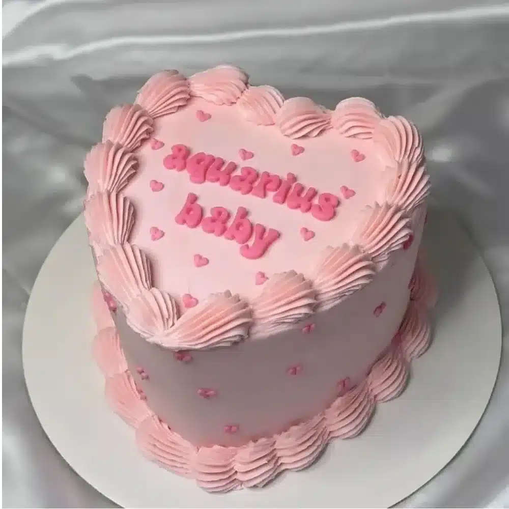 Pink vintage heart cake beautifully decorated for a special occasion
