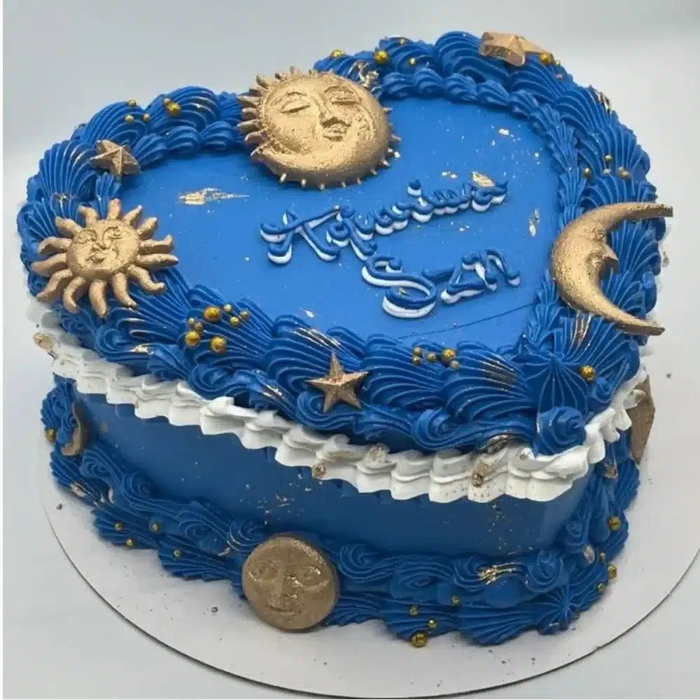 Aquarius Season themed blue heart cake decorated for a celebration.
