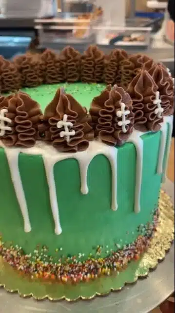 Decorative buttercream footballs ideal for Super Bowl celebrations