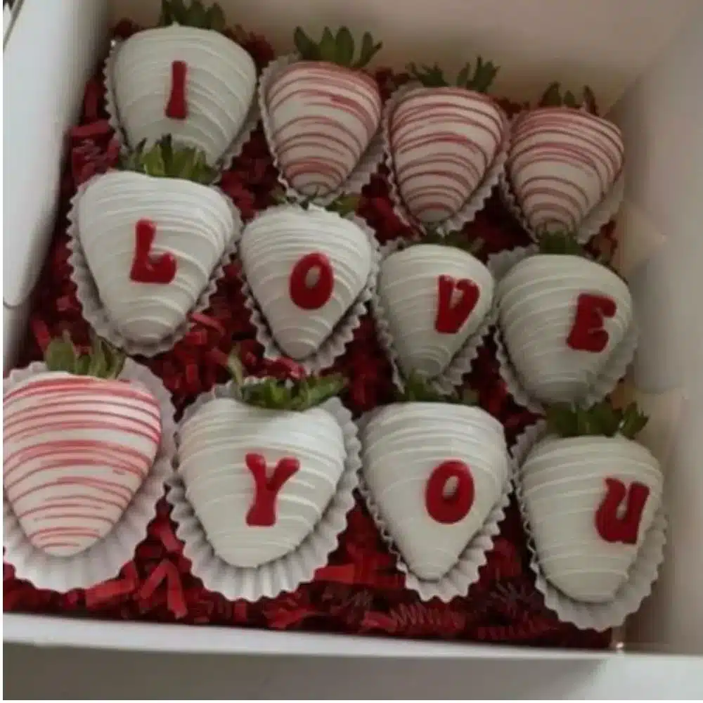 A variety of heart-shaped Valentine's Desserts including cakes and cookies.