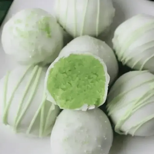 A variety of festive St. Patrick's Day desserts arranged for a celebratory display.