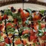 Delicious Bruschetta Dip served with fresh ingredients and crispy bread