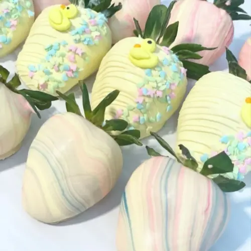 Delicious chocolate covered strawberries drizzled with white chocolate.