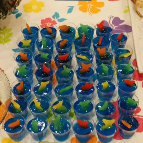 Dr. Seuss themed decorations for a baby shower featuring colorful balloons and Cat in the Hat accents.