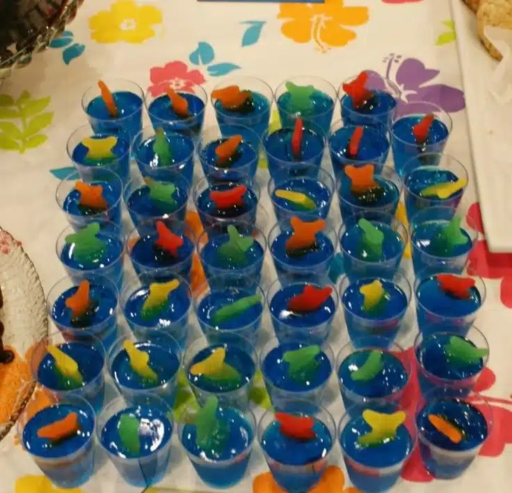 Dr. Seuss themed decorations for a baby shower featuring colorful balloons and Cat in the Hat accents.