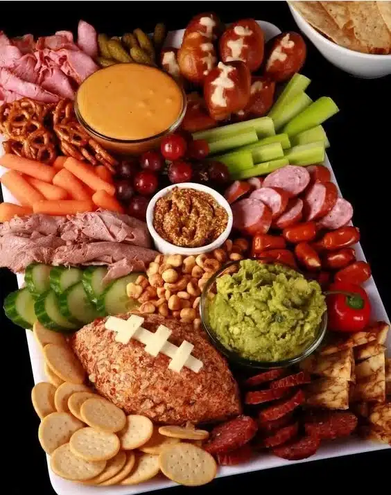 Delicious Game Day charcuterie board with meats, cheeses, and snacks