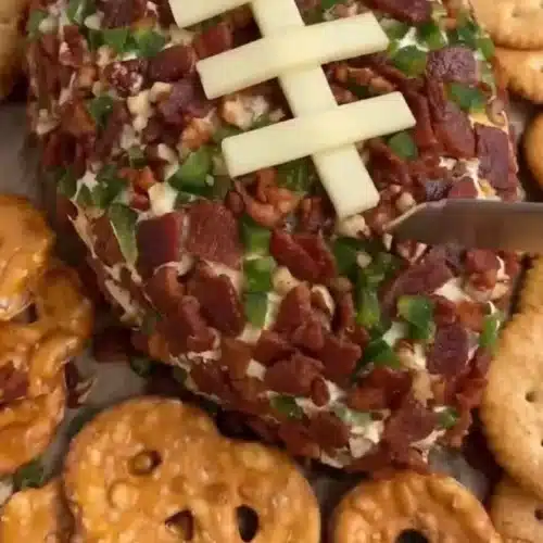 Jalapeño Popper Cheese Ball decorated for a football-themed party