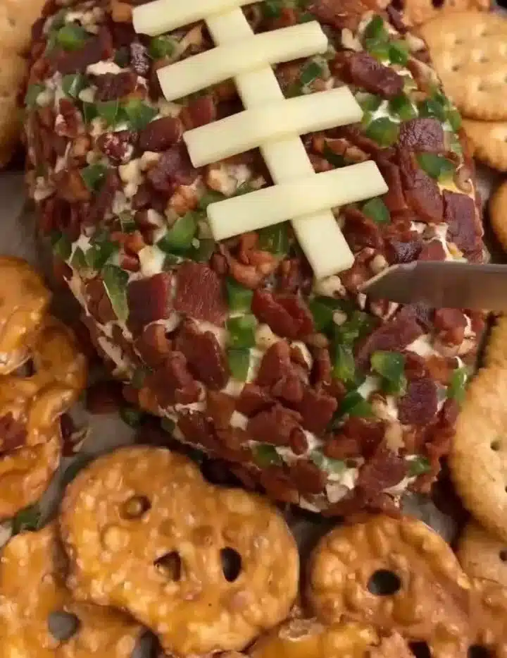 Jalapeño Popper Cheese Ball decorated for a football-themed party