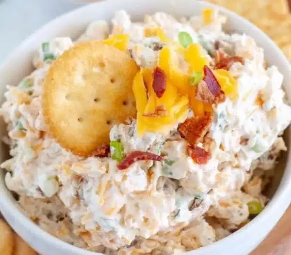 Delicious Million Dollar Crack Dip served in a bowl with tortilla chips