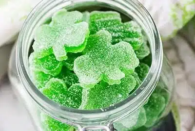 Shamrock homemade gummies with Jello on a colorful plate