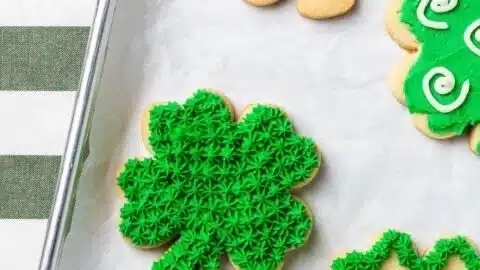 Delicious St. Patrick's Day sugar cookies decorated with green icing and sprinkles.
