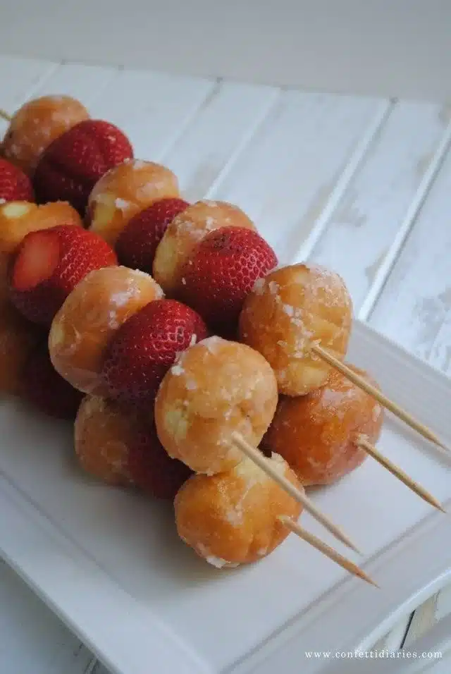 Delicious Strawberry Donut Kabobs with fresh strawberries and mini donuts on skewers