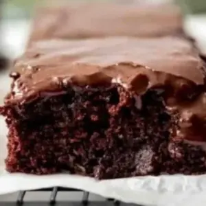 Delicious homemade zucchini brownies topped with chocolate chips.